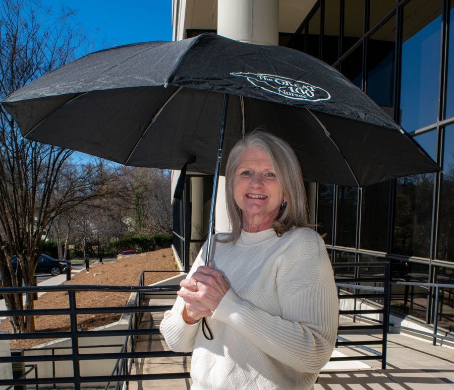 custom-printed umbrella given as a promotional product gift